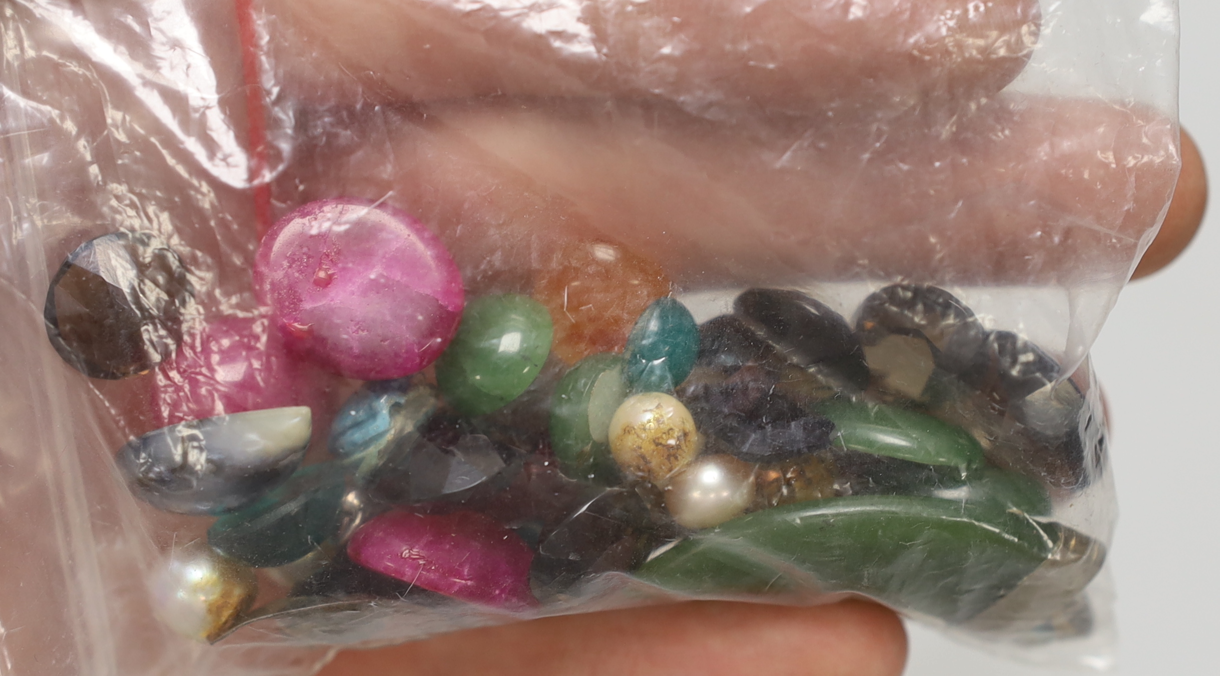 Loose unmounted diamonds, emeralds, rubies, etc.